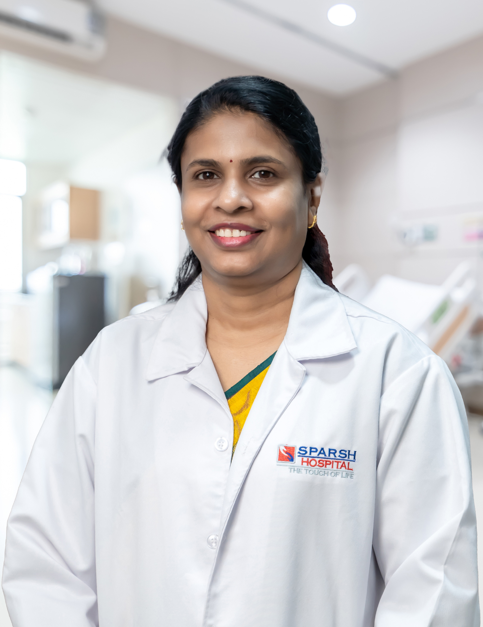 Dr. Divya L