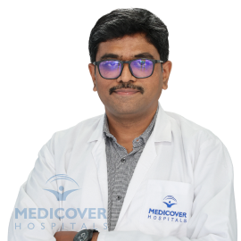 Dr. Satish J K